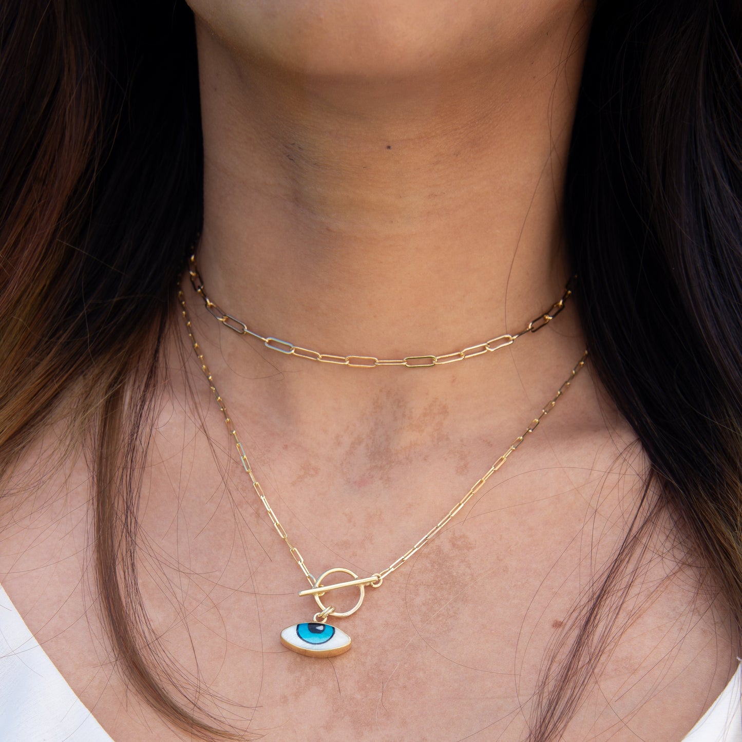 Adrano Eye Pendant and Paperclip Chain Necklace in 18K Gold Plated 925 Sterling Silver displayed on model's neck.