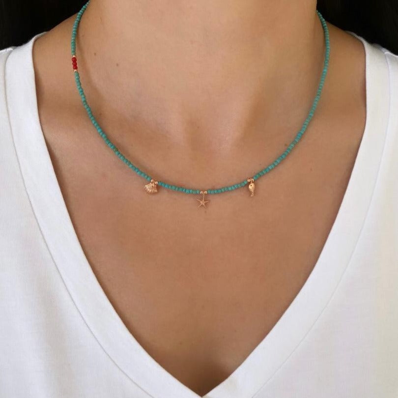 Elegant Atlantis Minimal Howlite Gemstone and Silver Necklace on a woman's neck