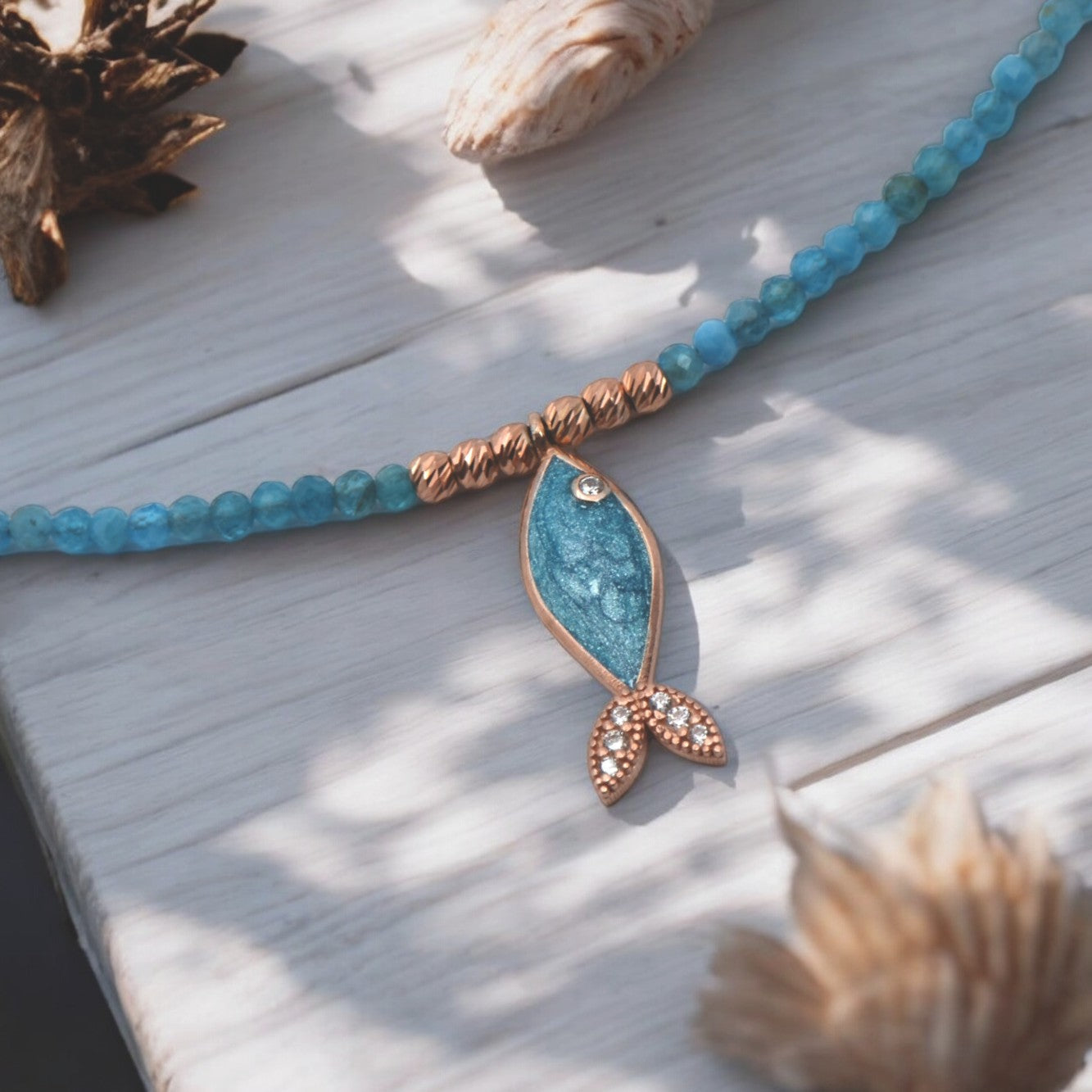 Azure Apatite Gemstone Fish Necklace with blue beads and gold accents