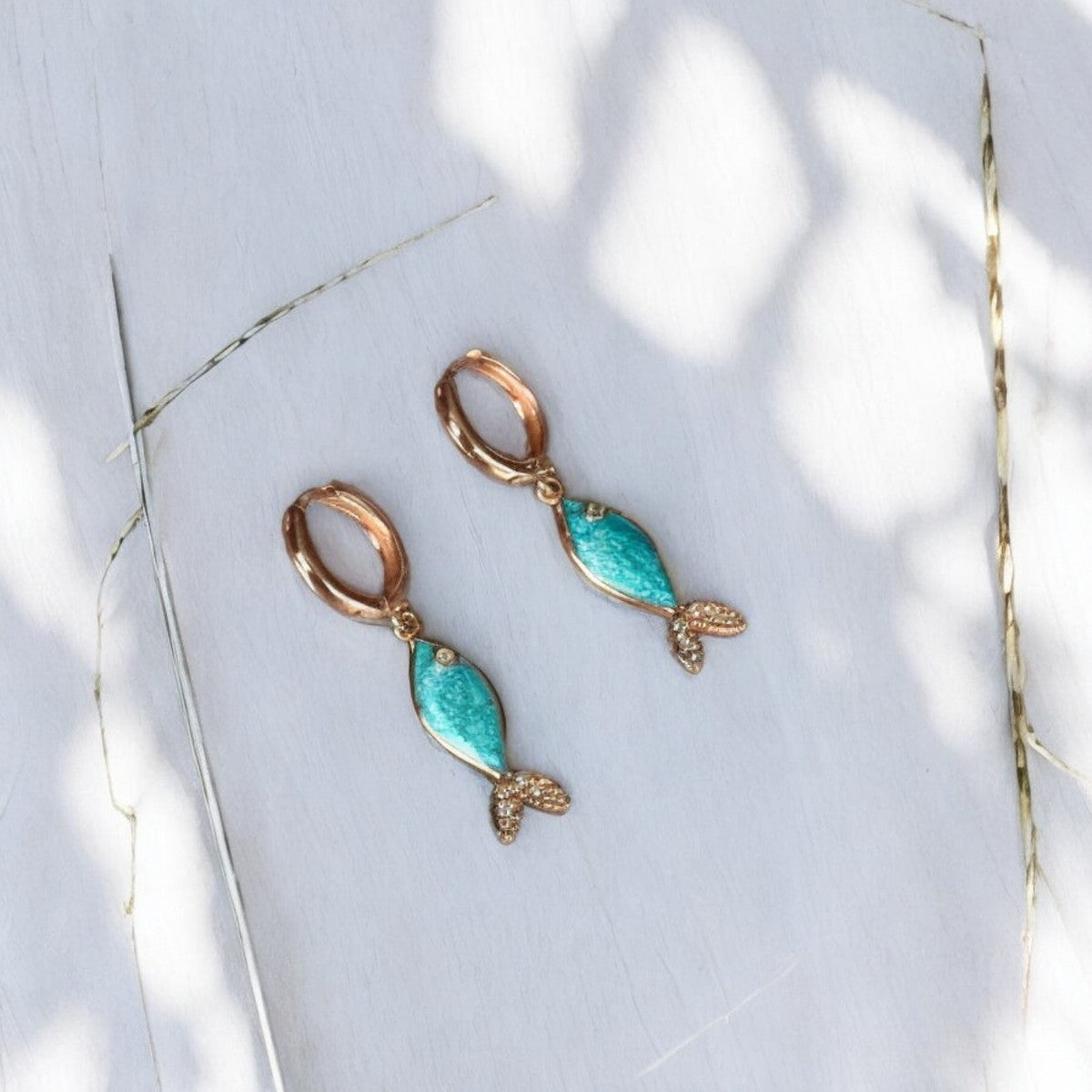 Azure Fish Earrings crafted in 925 Silver with Rose Gold Plating