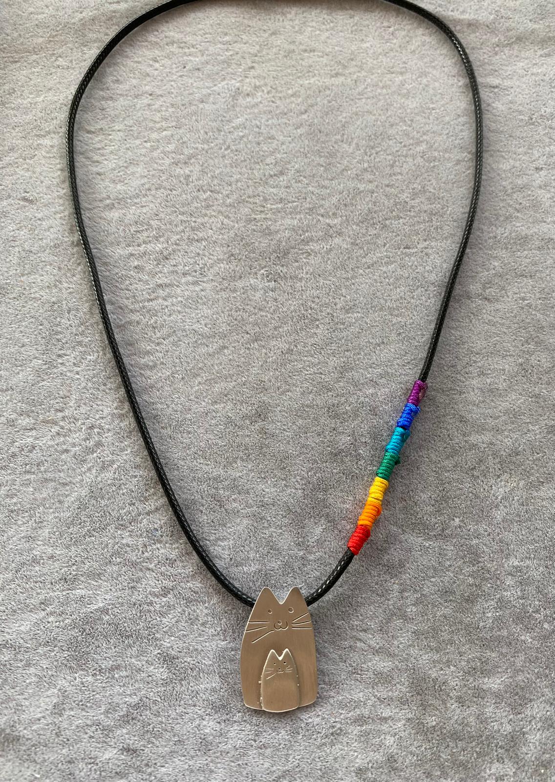 Cutie Cat Silver Necklace on black cord with rainbow thread accent