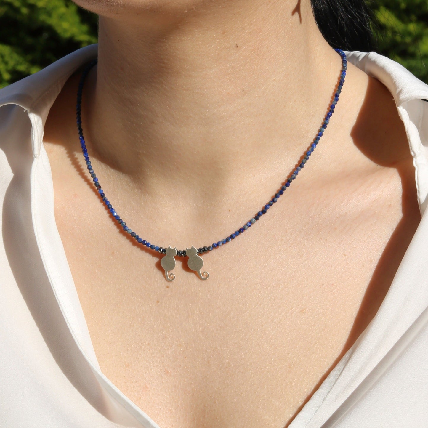 Duo Cats Lapis Silver Necklace on woman's neck