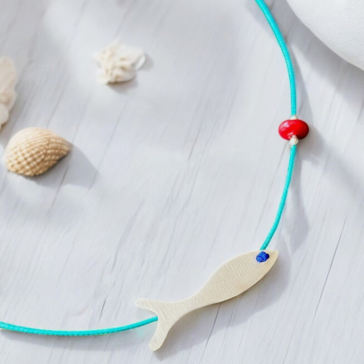 925 Silver Fish Necklace on Turquoise Cord with Red Bead