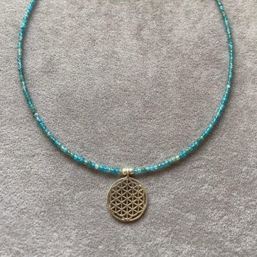 Flower of Life Apatite Necklace with intricate pendant and beaded chain