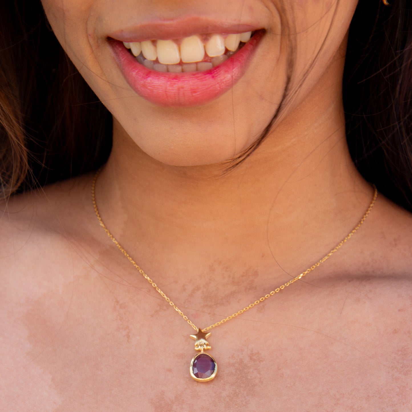 Foligno Purple Cat's Eye Gemstone Gold Plated Silver Chain Necklace worn by a smiling model