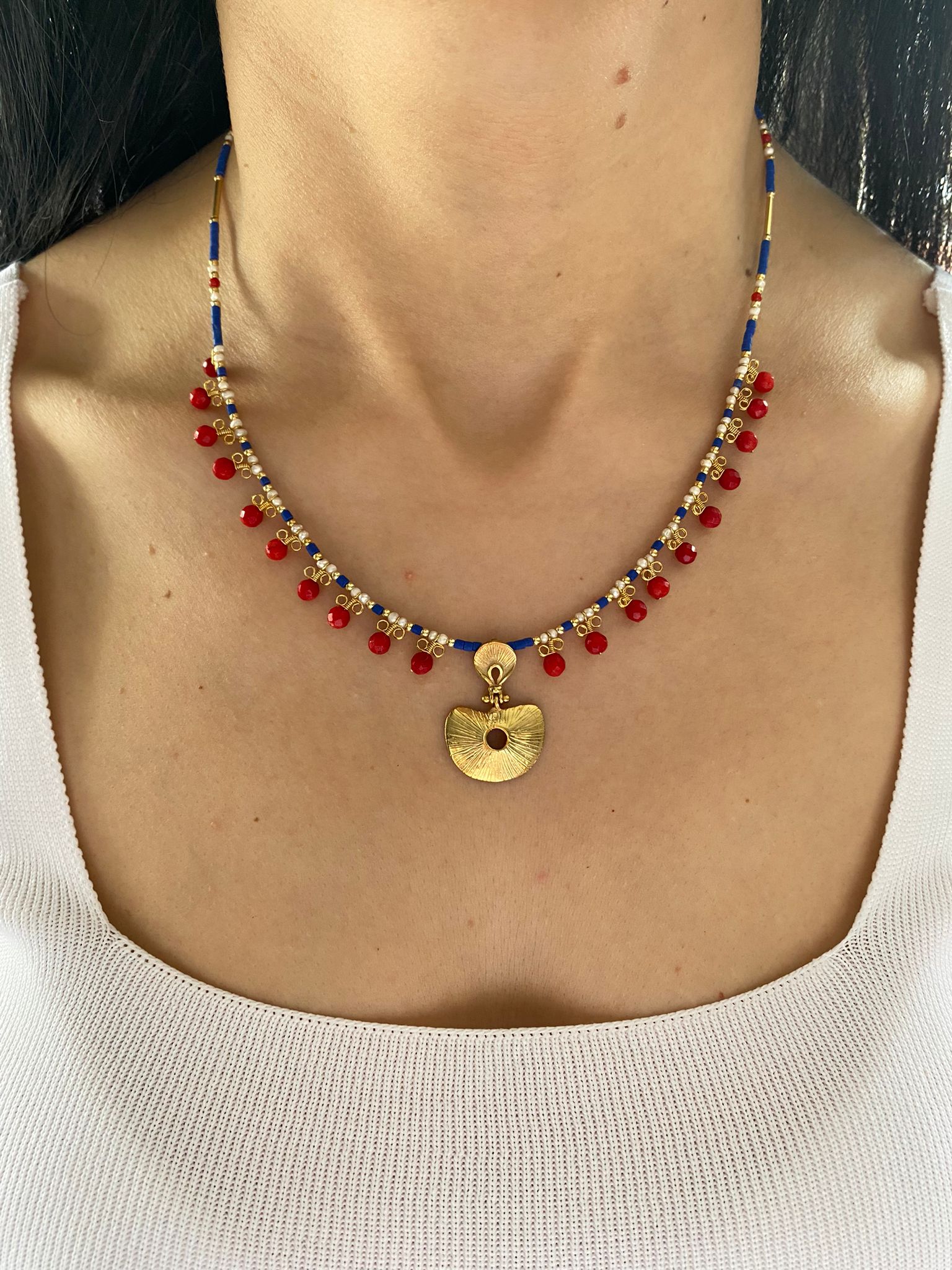 Hera Coral and Lapis Lazuli Gemstone Necklace in 925 Silver with Gold Plating worn by a model