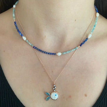 Ibiza Silver Fish and Pearl Lapis Amazonite Necklace Set worn on a woman's neck