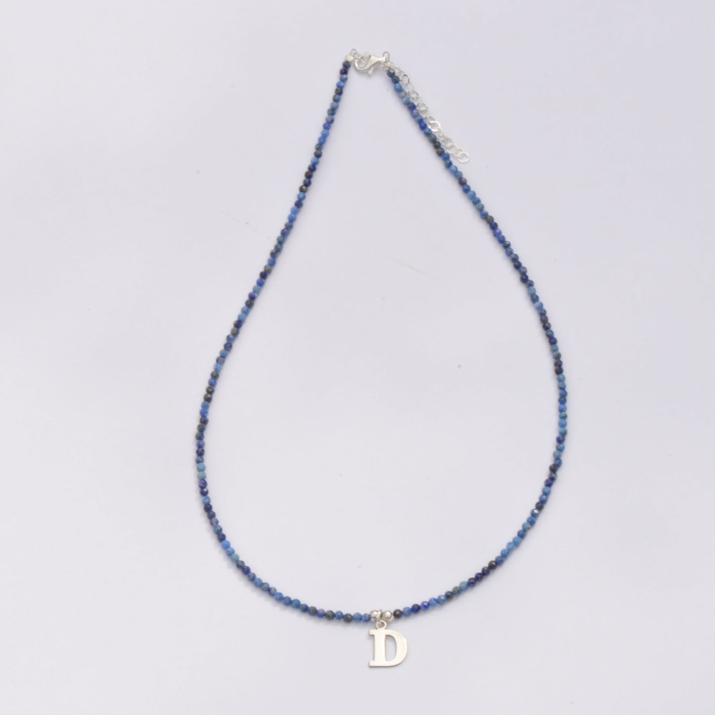 Lapis Lazuli Gemstone Beaded Initial Necklace with 'D' charm on a white background