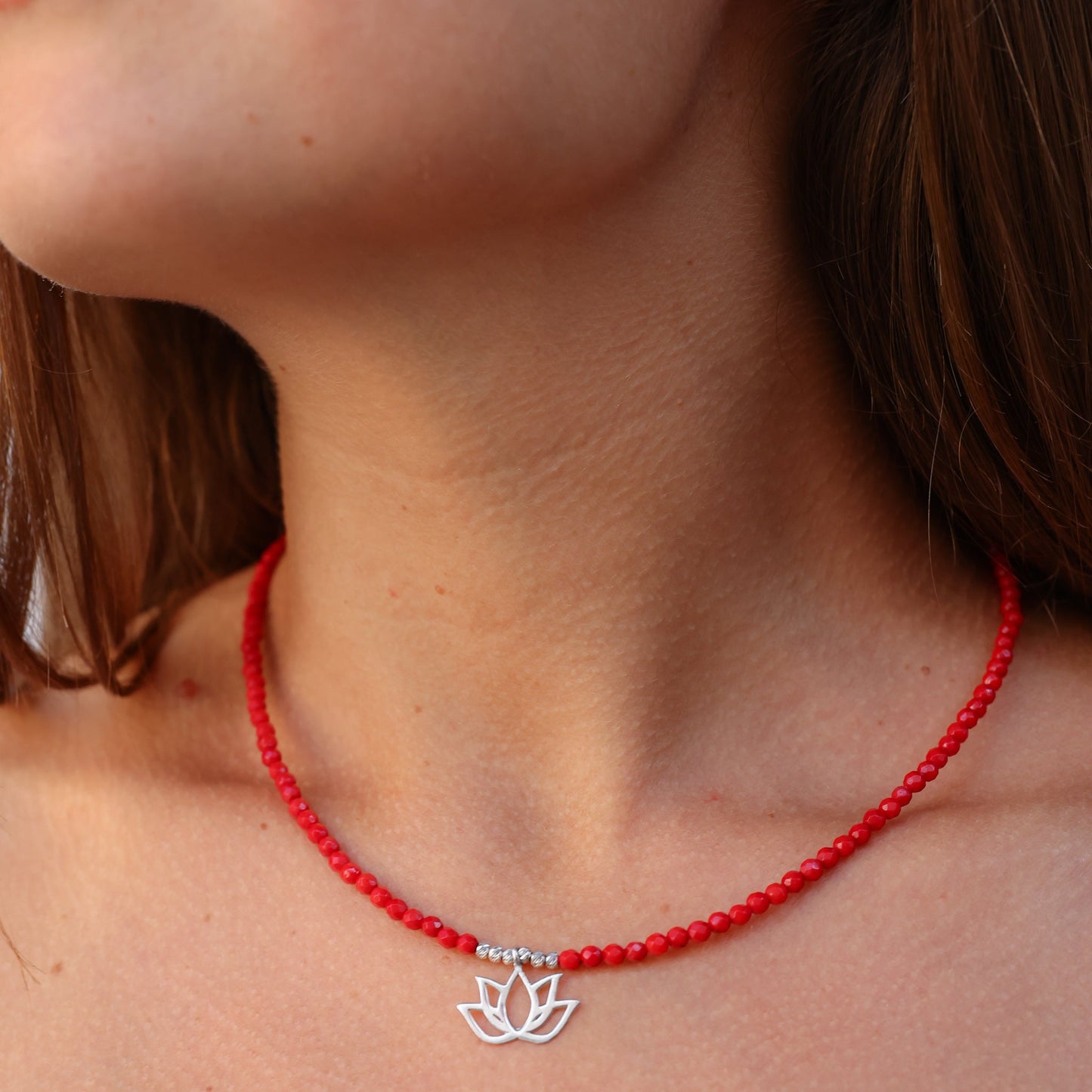 Woman wearing Lotus Flower Coral Gemstone Beaded Necklace