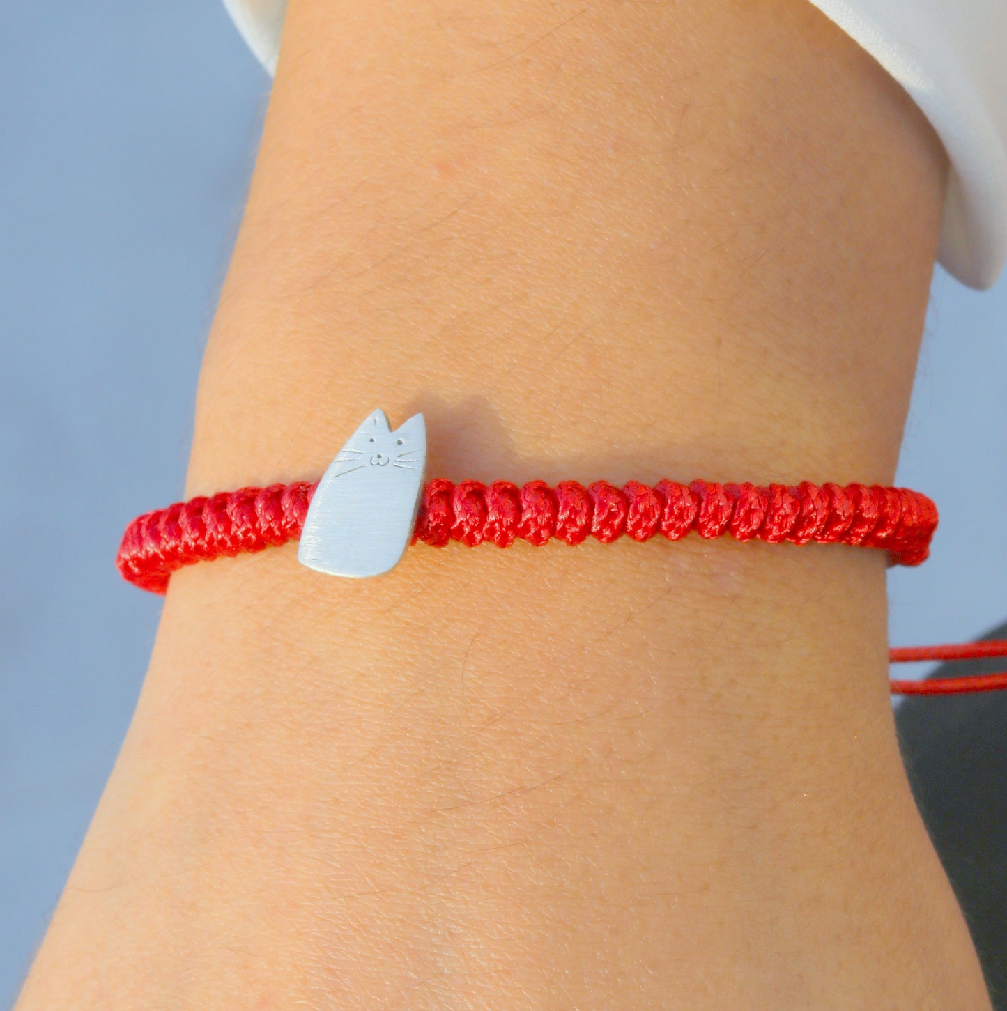 Close-up of My Kitten Friend Silver Red Bracelet on wrist