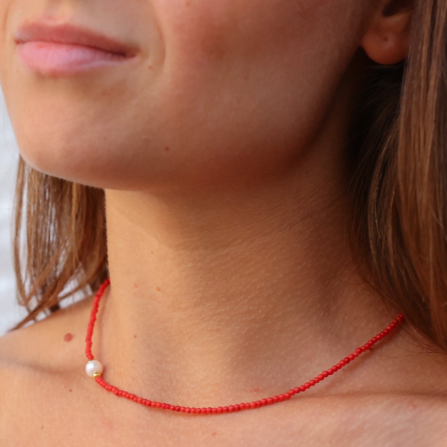 Nola Coral & Turquoise Beaded Necklace worn by a woman