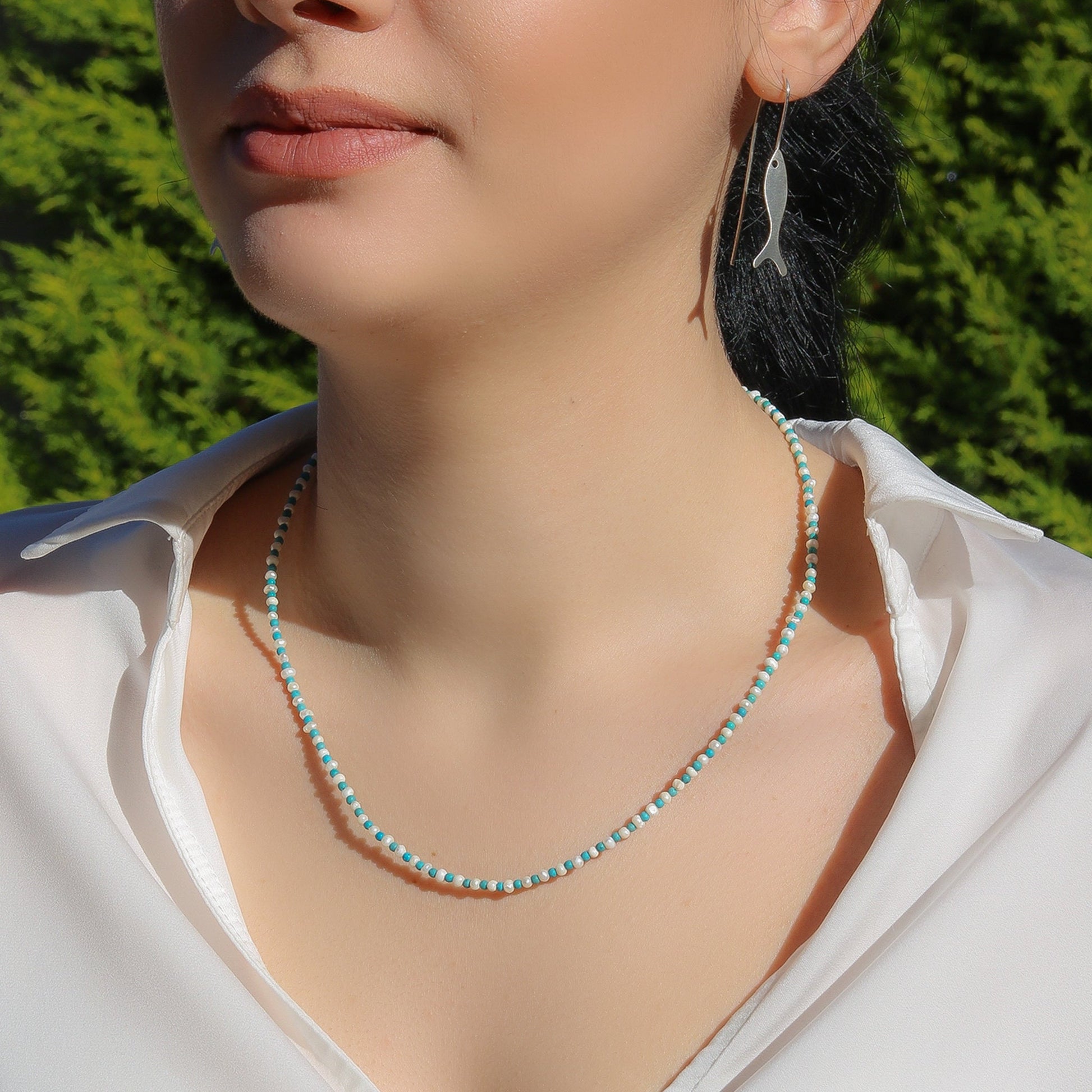 Woman wearing Pearl and Blue Howlite Gemstone Beaded Necklace