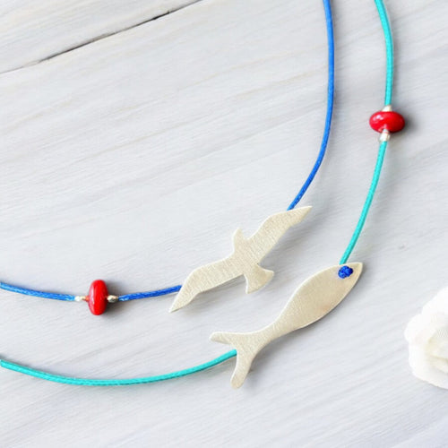 Seagull and Fish Silver Necklace on blue and green strings with red beads