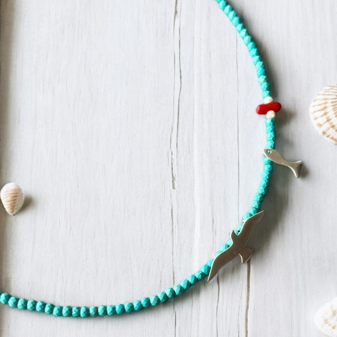 Seagull and Fish Turquoise Gemstone Necklace with Handcrafted 925 Silver, Pearl, and Coral accents.