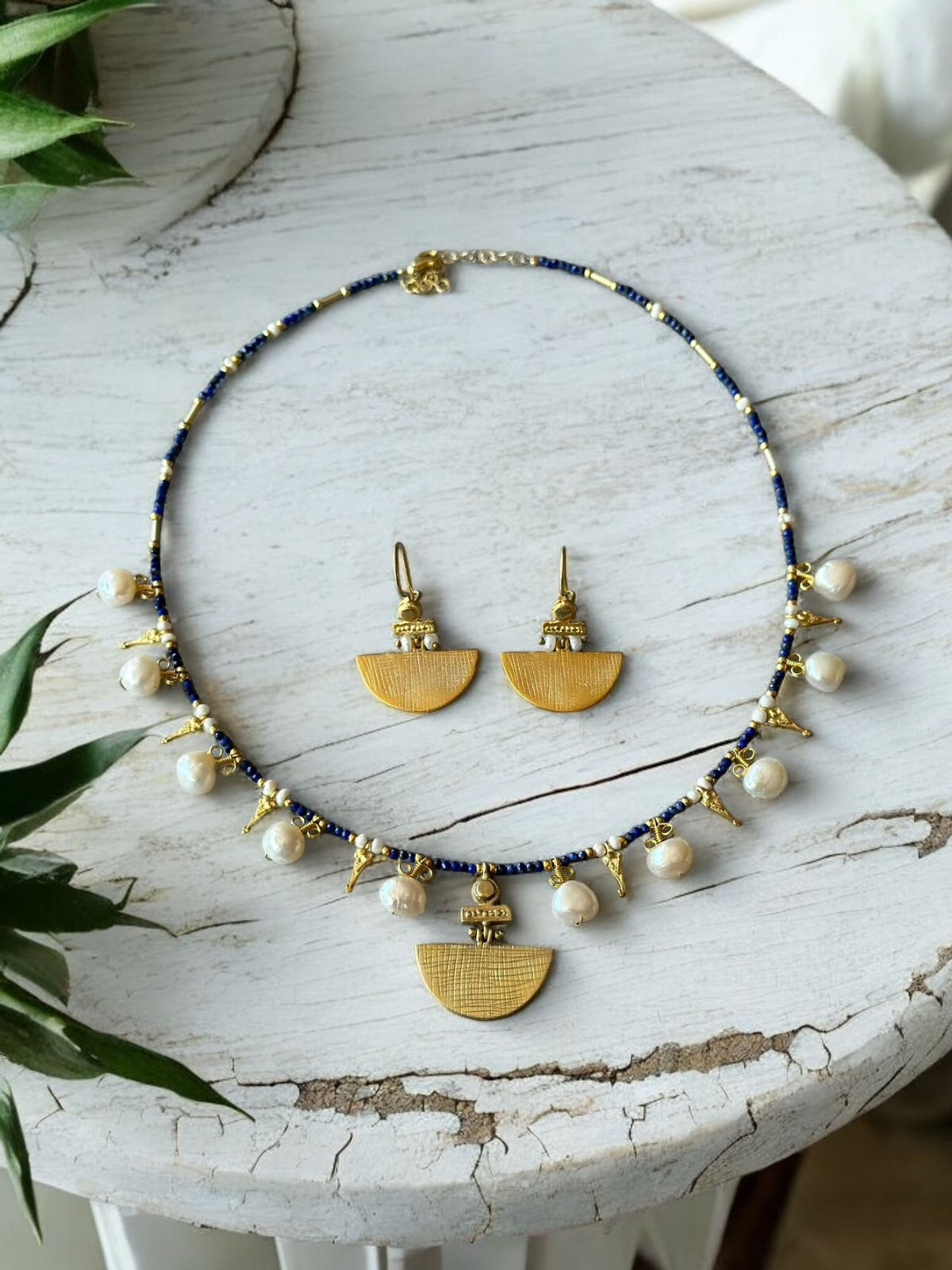 Selena Lapis Lazuli Necklace and Earrings Set - 14K Gold Plated with Pearl Accents on Rustic White Background