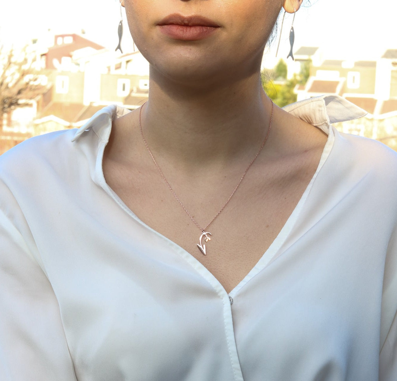 Woman wearing a Snowdrop Flower Silver Rose Gold Plated Necklace