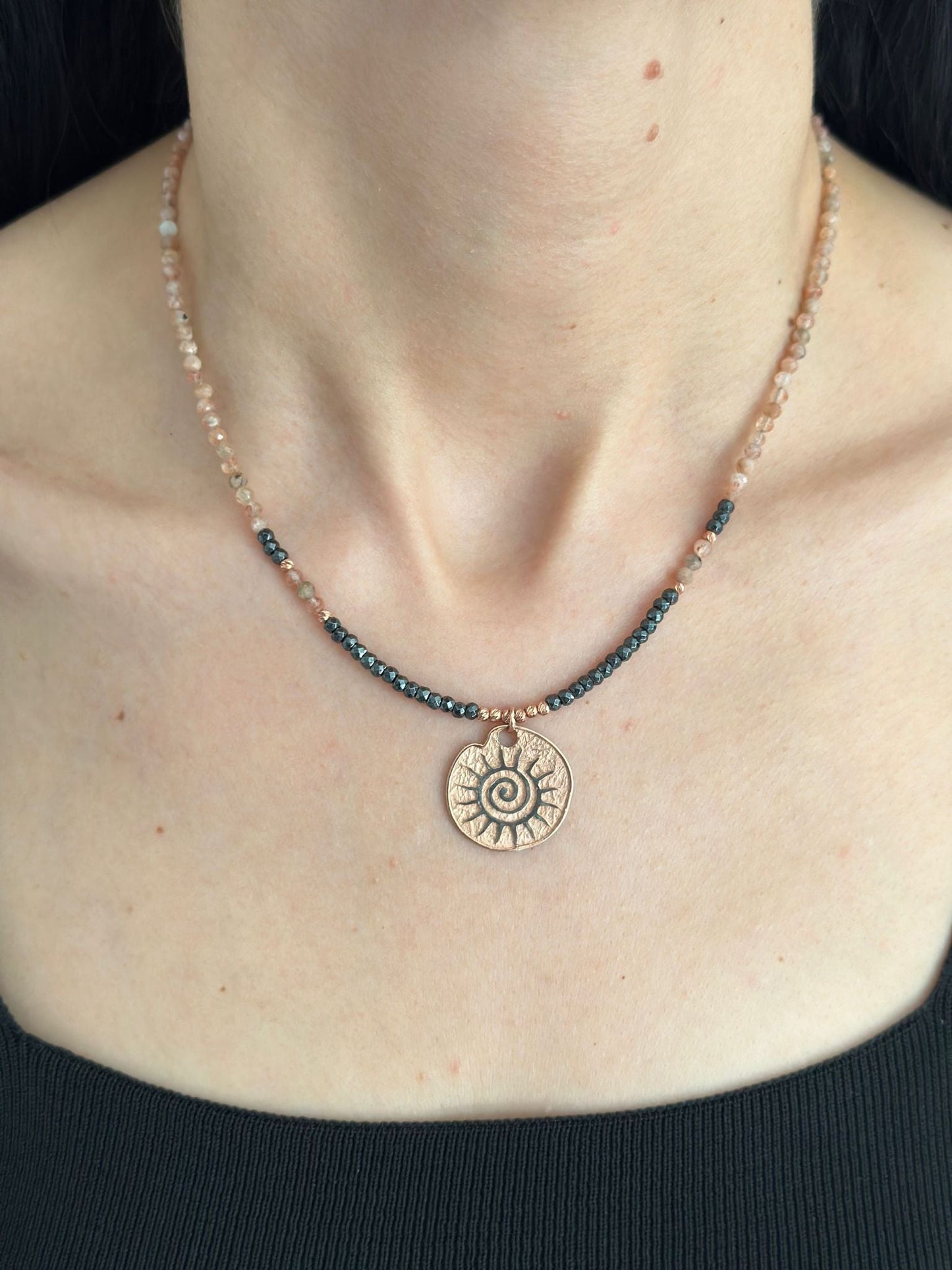 Sun Necklace with Sunstone Gemstone and Hematite in 925 Sterling Silver Rose Gold Plated worn on a neck