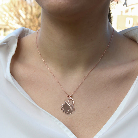 Swan 925 Sterling Silver Rose Gold Necklace worn on a woman's neck.